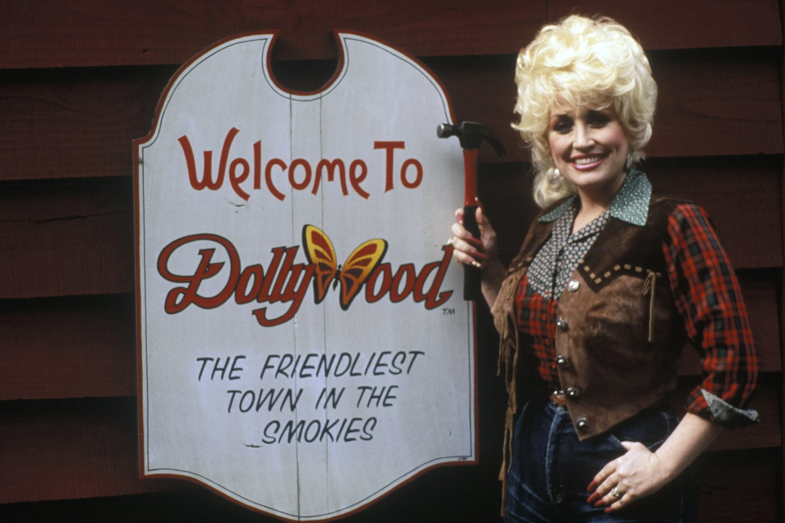 Dolly Parton and the Herschend brothers announcing the partnership